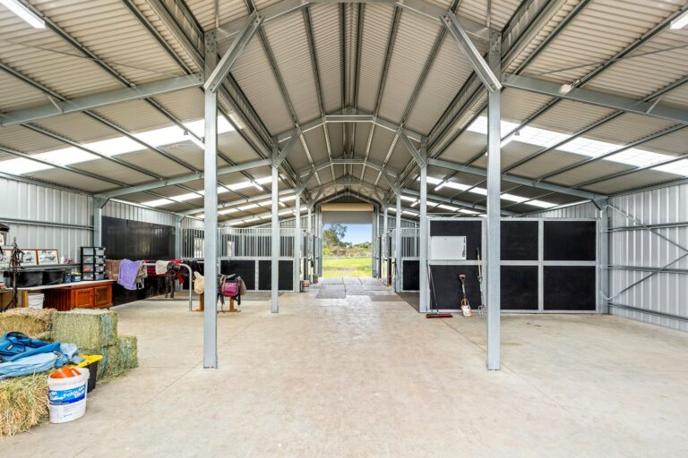 Equibaord stables in American style barn