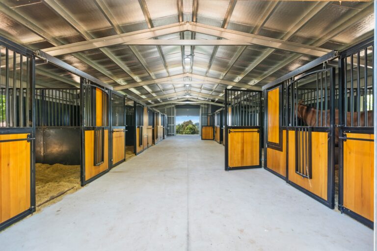 Horse stables with hardwood infill and powder coated frame in black