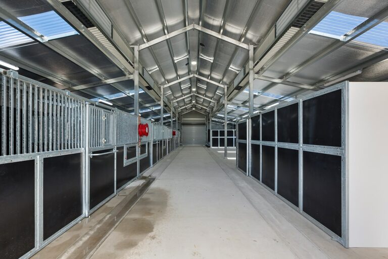 RSPCA Horse stables with rotating feeder section and opening hatch