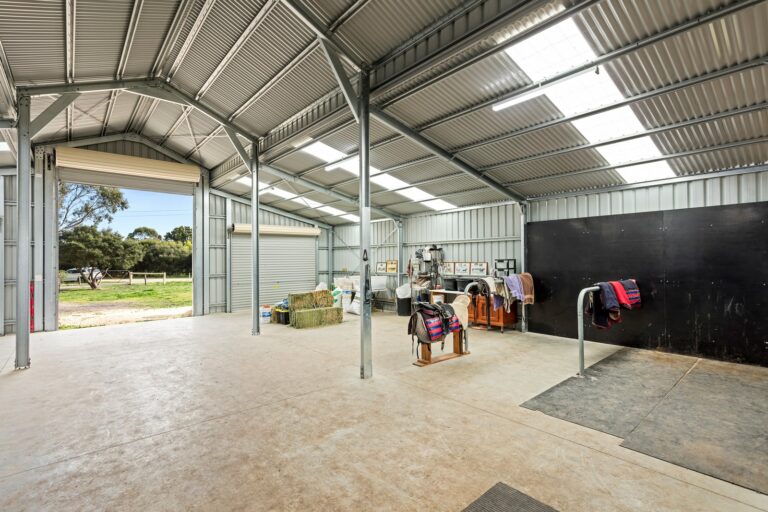 Equibaord stables in American style barn