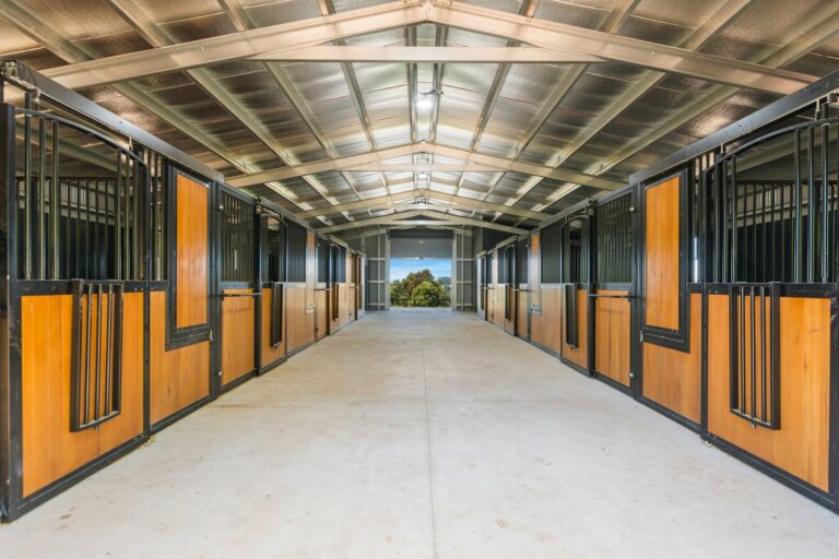 Horse stables with hardwood infill and powder coated frame in black