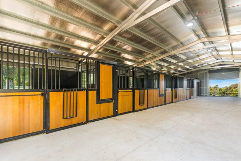 Horse stables with hardwood infill and powder coated frame in black