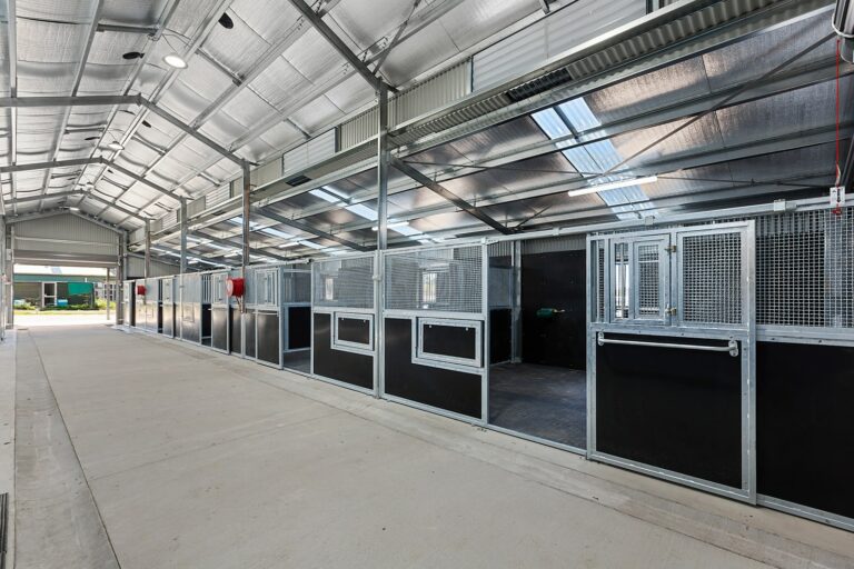 RSPCA Horse stables with rotating feeder section and opening hatch