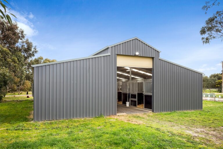 Equibaord stables in American style barn