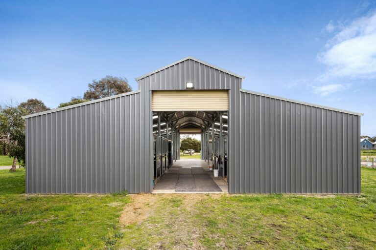 Equibaord stables in American style barn